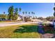 Landscaped community entrance with signage and palm trees at 18128 Villa Creek Dr # 18128, Tampa, FL 33647