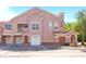 Two-story condo building with attached garage and balcony at 18128 Villa Creek Dr # 18128, Tampa, FL 33647
