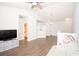 Open concept living area with hardwood floors and high ceilings at 18128 Villa Creek Dr # 18128, Tampa, FL 33647
