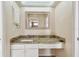 Convenient bathroom with granite vanity and built-in storage at 2925 Winding Trail Dr, Valrico, FL 33596