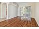 Dining room with hardwood floors and sliding glass doors to backyard at 2925 Winding Trail Dr, Valrico, FL 33596