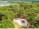 Aerial view of a playground nestled within a wooded park at 2925 Winding Trail Dr, Valrico, FL 33596