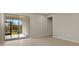 Bright bedroom with sliding glass doors to a private patio at 31464 Woodland Race Loop, Wesley Chapel, FL 33545