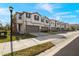 Brand new townhouses with attached garages and lush landscaping at 31464 Woodland Race Loop, Wesley Chapel, FL 33545