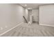 Upper hallway with neutral walls and carpet flooring at 31471 Woodland Race Loop, Wesley Chapel, FL 33545