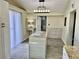 Modern kitchen with island and updated cabinetry at 4732 W Lawn Ave, Tampa, FL 33611