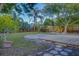 Spacious backyard, deck, and tropical landscaping at 5135 Newton S Ave, Gulfport, FL 33707