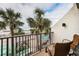 Balcony overlooking the pool and ocean at 7100 Sunset Way # 205, St Pete Beach, FL 33706