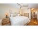 Spacious Primary bedroom with king-size bed and ensuite bathroom at 7100 Sunset Way # 205, St Pete Beach, FL 33706