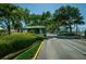 Gated entrance to community with guard house at 7100 Sunset Way # 205, St Pete Beach, FL 33706