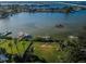 Wide view of waterfront property and surrounding neighborhood at 118 Harbor View Ln, Belleair Bluffs, FL 33770