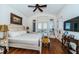 Spacious bedroom with king-size bed and water views at 118 Harbor View Ln, Belleair Bluffs, FL 33770