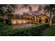 Beautiful home with three-car garage and landscaping at 118 Harbor View Ln, Belleair Bluffs, FL 33770