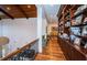 Upper hallway with wood ceilings and hardwood floors at 118 Harbor View Ln, Belleair Bluffs, FL 33770