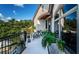 Private patio with seating area and lush greenery at 118 Harbor View Ln, Belleair Bluffs, FL 33770