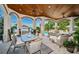 Covered patio overlooking the pool and waterfront at 118 Harbor View Ln, Belleair Bluffs, FL 33770