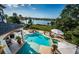 Inviting pool and spa with expansive water views at 118 Harbor View Ln, Belleair Bluffs, FL 33770