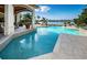 Stunning pool and patio area with waterfront views at 118 Harbor View Ln, Belleair Bluffs, FL 33770