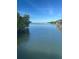 Calm water with clear view across the waterway at 1866 Venetian Point Dr, Clearwater, FL 33755