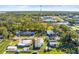 Aerial view of residential neighborhood with homes and surrounding landscape at 712 E Madison St, Plant City, FL 33563