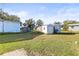 Large backyard with shed and open space at 712 E Madison St, Plant City, FL 33563