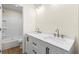 Bathroom featuring double vanity and marble countertop at 712 E Madison St, Plant City, FL 33563