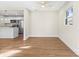 Spacious living room featuring hardwood floors and a ceiling fan at 712 E Madison St, Plant City, FL 33563