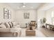 Bright and airy living room featuring a comfortable sofa and stylish coffee table at 712 E Madison St, Plant City, FL 33563