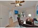Home office with a large desk and comfortable chair, near other rooms at 4978 71St N St, St Petersburg, FL 33709