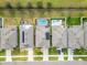 Row of houses with pools and solar panels at 11411 Alachua Creek Ln, Riverview, FL 33579