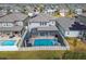 House with pool and solar panels in a neighborhood at 11411 Alachua Creek Ln, Riverview, FL 33579