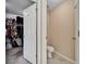 Small half bathroom with toilet and sink at 11411 Alachua Creek Ln, Riverview, FL 33579