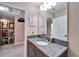 Simple bathroom with granite countertop and a single sink vanity at 11411 Alachua Creek Ln, Riverview, FL 33579