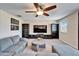 Spacious bonus room with large TV and ample seating at 11411 Alachua Creek Ln, Riverview, FL 33579