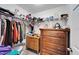 Well-organized closet with ample hanging space and shelving at 11411 Alachua Creek Ln, Riverview, FL 33579