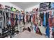 Large walk-in closet with ample shelving and hanging space at 11411 Alachua Creek Ln, Riverview, FL 33579