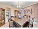 Dining area with a large table, six chairs and a buffet at 11411 Alachua Creek Ln, Riverview, FL 33579
