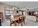 Dining room with view into Gathering room and pool at 11411 Alachua Creek Ln, Riverview, FL 33579