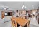 Open concept dining room with kitchen and Gathering room views at 11411 Alachua Creek Ln, Riverview, FL 33579