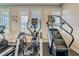 Fitness center with cardio equipment, including elliptical and stair climber at 11411 Alachua Creek Ln, Riverview, FL 33579