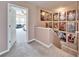 Upstairs hallway with access to bedrooms and bonus room at 11411 Alachua Creek Ln, Riverview, FL 33579