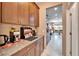 Spacious kitchen with granite countertops, stainless steel appliances, and ample cabinetry at 11411 Alachua Creek Ln, Riverview, FL 33579