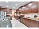 Modern kitchen with stainless steel appliances and granite countertops at 11411 Alachua Creek Ln, Riverview, FL 33579