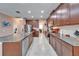 Modern kitchen with stainless steel appliances and granite countertops at 11411 Alachua Creek Ln, Riverview, FL 33579