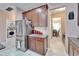 Kitchen features stainless steel appliances and granite countertops at 11411 Alachua Creek Ln, Riverview, FL 33579