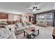 Comfortable living room with sectional sofa and coffee table at 11411 Alachua Creek Ln, Riverview, FL 33579