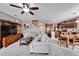 Open concept living room with kitchen and stairs view at 11411 Alachua Creek Ln, Riverview, FL 33579