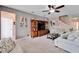 Living room with sectional sofa and built-in shelving at 11411 Alachua Creek Ln, Riverview, FL 33579
