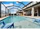 Inviting pool and patio with comfortable seating at 11411 Alachua Creek Ln, Riverview, FL 33579