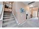 Upstairs hallway with carpeted floors and movie posters at 11411 Alachua Creek Ln, Riverview, FL 33579